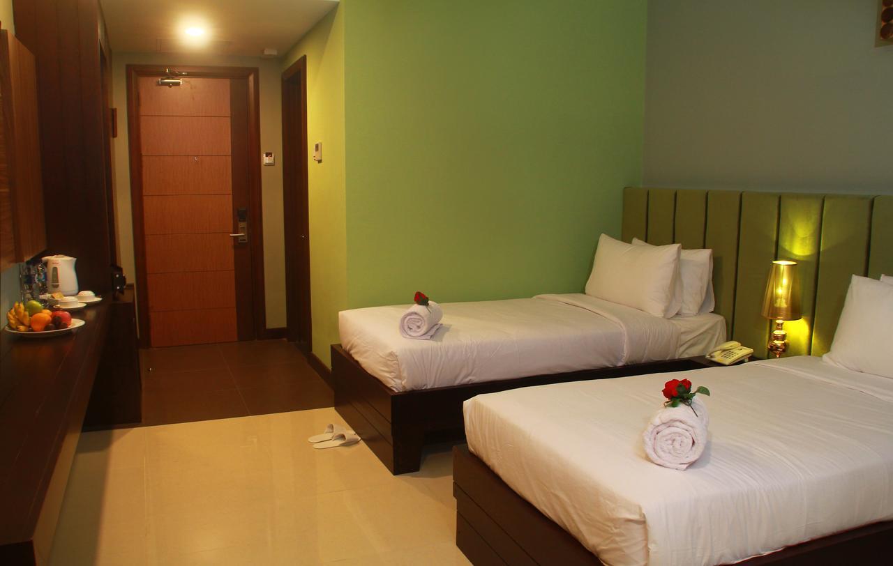 Sutanraja Hotel Kotamobagu Kültér fotó